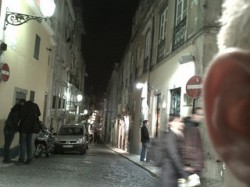 A-somewhat-obvious-drug-deal-being-conducted-on-a-Lisbon-street-Mark-Hillary-250x187