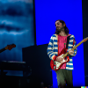 DALL·E 2022-10-05 11.59.57 - John Frusciante soloing at Slane Castle with Gorillaz.png